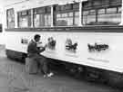Painting of designs on Tram No. 513 used in the Last Tram Week celebrations 