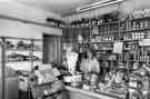 Off licence and grocers at the junction of Richards Road and Prospect Road, Heeley showing Mrs Clarricoats (centre)