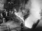 Tapping a 30 ton electric arc furnace at English Steel Corporation 