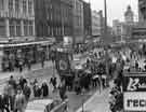 View: s41213 March against the Industrial Relations Bill proceeding up Fargate showing No 40, Davy's Building, Victoria Cafe and Arthur Davy and Sons Ltd., provision merchants  (left)