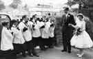 Pay up or else. Choir boys hijacking the bride and groom at the church gate, St. Mary's Church, Handsworth