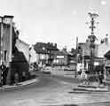 Market Cross and stocks, Market Square, Woodhouse showing (right) Harrison and Kemshall, butchers (No.16) Market Cross and stocks, Market Square, Woodhouse showing (right) Harrison and Kemshall, butchers (No.16)