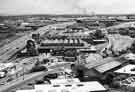 View over Lower Wybourn from Hyde Park Flats showing the Sheffield Corporation Abattoir (centre); Park Garages Ltd (bottom centre) and the Belle Vue Hotel (centre) with Cricket Inn Road running from bottom left and the Sheffield Parkway (left)
