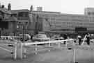 View: s41818 Construction of the Council car park at the back of Norfolk Street and Surrey Street showing the College of Technology (centre) (later Sheffield Polytechnic)
