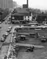Construction of a car park on the site of the old Corn Exchange showing (centre) W. H. Benson Ltd., carpet dealers, No.32 Broad Street Construction of a car park on the site of the old Corn Exchange showing (centre) W. H. Benson Ltd., carpet dealers, No.32 Broad Street