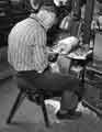 Mr Gill working on the handle boring machine, Joseph Elliot and Sons, Sylvester Works, cutlery manufacturers, Sylvester Street 