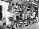Working at a cutlery press at Hiram Wild Ltd., cutlery manufacturers, Central Works, Herries Road, Shirecliffe 