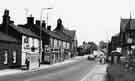 Manchester Road, Stocksbridge showing (left) the Coach and Horses public house and St. Matthias C.of E. Church