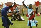 Escafeld Medieval Society enacting a jousting contest c.1987