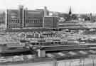 View of Midland Station (foreground) from Granville Street showing College of Technology (back left and centre) and Ponds Forge bus station (right)