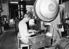 Clipping spoons and forks at Hiram Wild Ltd., cutlery manufacturers, Central Works, Herries Road, Shirecliffe 