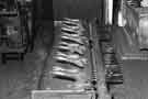 Gigging the cutlery before polishing at Hiram Wild Ltd., cutlery manufacturers, Central Works, Herries Road, Shirecliffe