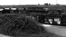 Diesel locomotive towing coal trucks at Woodhouse Junction