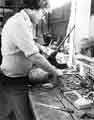 Frank Carr junior, putting the rivet through and onto a butcher scale handled knife, Joseph Elliot and Sons Ltd,, Sylvester Works, cutlery manufacturers, Sylvester Street