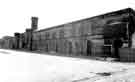 Clock tower and troopers stables viewed from the Langsett Road side of the artillery parade ground, Hillsborough Barracks. 