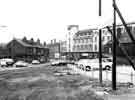 Clarence Street looking towards junction with Ecclesall Road showing (left) Curtis (Plumbers) Ltd., plumbers and glaziers, No.165 and (centre) The Arcade, Sheffield and Ecclesall Co-operative Society, Nos.21-41 Ecclesall Road