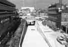 Construction of Furnival Square roundabout and underpass showing (right) Arnold Carter and Co. Ltd, builders and plumbers merchants, Trinity Works and (left) Savemore supermarket Construction of Furnival Square roundabout and underpass showing (right) Arnold Carter and Co. Ltd, builders and plumbers merchants, Trinity Works and (left) Savemore supermarket