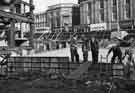 High Street and the construction of Castle Square showing (l.to r.) Nos.35-37 England's Smart Shoes Ltd., No.41 John Collier (Prices Tailors Ltd), tailors, No. 43 Swears and Wells Ltd., furriers