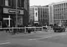 Construction of Castle Square showing (left) No. 47 Manfield and Sons Ltd., shoe shop, (centre) Royal Exchange Buildings and (right) Peter Robinson Ltd., department store, Nos. 51 - 57 High Street Construction of Castle Square showing (left) No. 47 Manfield and Sons Ltd., shoe shop, (centre) Royal Exchange Buildings and (right) Peter Robinson Ltd., department store, Nos. 51 - 57 High Street