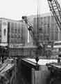 Construction of Castle Square showing (back left) Guardian Royal Exchange Assurance and (back right) Peter Robinson Ltd., department store, Nos. 51 - 57 High Street