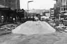 Construction of Castle Square showing (left) T. B. and W. Cockayne Ltd., department store, Angel Street