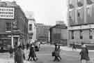 Surrey Street at the junction (left) with Norfolk Street showing (No.117) Hibbert Brothers, picture framers and fine art dealers, (right) Town Hall extension (known as the Egg Box (Eggbox)) and (centre) Central Library and Sheffield Hallam University