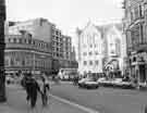 Surrey Street looking towards (centre) Fargate and the entrance to Orchard Square shopping centre and (centre left) Leopold Street showing (right) Yorkshire Bank Chambers