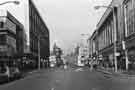 Shops on The Moor showing (left)  Nos.16 - 18 Dixons Ltd., photographic equipment, audio visual and electronics store and Debenhams, department store