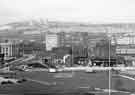 View: s44746 View of (bottom) Park Square roundabout showing (left) Exchange Place, (centre) the Canal Basin (centre right) Royal Victoria Hotel and (back) Pye Bank and Woodside Flats
