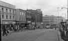 High Street showing (left) Manfield and Sons Ltd., shoe shop; No.31 The Old Blue Bell public house and Nos. 59 - 65 C and A Modes Ltd., department store