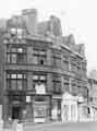 View: s44968 Derelict shops on Church Street prior to demolition showing (left to right) St. James Chambers, Vincent and Co. (Tailors) Ltd. (No.54); Ladbrokes, bookmakers (Nos. 50-52) and Newcastle Upon Tyne Permanent Building Society (N.48)