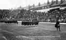 View: s45188 Coronation Day Celebrations at Bramall Lane for King George V depicting the march of the clans