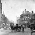 High Street showing (right) No.6 William Lewis, tobacconist, and Foster and Son, tailors, c.1890 