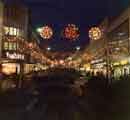 Christmas lights on The Moor showing (left) Habitat, furniture store and (right) Nos. 43-51 British Home Stores