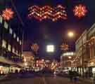 Christmas lights on The Moor showing (left) Debenhams, department store