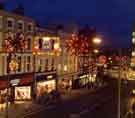 Christmas lights on Haymarket showing (l.to r.) No. 15 Foster Menswear Ltd., Tammy (Girls Wear) Ltd. and No.17 Etam Ltd.