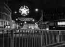 Christmas decorations on High Street at the junction with (right) Fargate showing Nos. 10 - 12 H. Samuel Ltd., jewellers and Nos.14-16 Van Allan Ltd. ladies outfitters