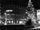 View: s45462 Christmas decorations on Fargate showing (centre left) Wilson Peck, Beethoven House, Nos.66-70 Leopold Street and (left) the Goodwin Fountain