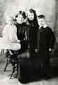 Mrs Mary Elizabeth Butler (second left), Florence Butler (later Askham) (centre), Arthur Butler and (left) baby John Butler, c.1915 Mrs Mary Elizabeth Butler (second left), Florence Butler (later Askham) (centre), Arthur Butler and (left) baby John Butler, c.1915