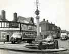 Royal Hotel, No. 10 Market Square, Woodhouse, at junction of Cross Street showing (centre) Woodhouse Market Cross and (right) Melia's Supermarket