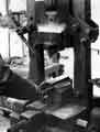 View: s45895 George Sainsbury operating a small drop hammer, J. H. Dickinson Ltd., cutlery manufacturers, Lowfield Cutlery Forge, Guernsey Road