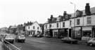 Shops on Chesterfield Road at junction with Aisthorpe Road (centre) showing (right to left) Woodseats Photographics Ltd (No.673) and M. and A. Leather Fashions