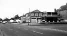 Abbeydale Road at the junction of Hastings Road showing Geoff Hall Carpets and Park Grange Motors, car dealers and service station