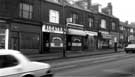 Shops on Chesterfield Road showing (r.to l.) Rother Plant Hire Ltd; Chesterfield Road Post Office; Toools, new and second hand tools and Alcatraz Restaurant