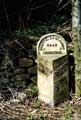 Mile-stone at Moorwood, north side of road near Swinglee Farm on the Sheffield and Glossop Road