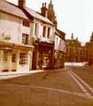 Shops on Leopold Street at junction of Orchard Street prior to the Orchard Square redevelopment