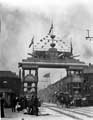 View: t07525 Decorative arch on Savile Street to celebrate the royal visit of King Edward VII and Queen Alexandra, sponsored by John Brown and Co., designed and erected by G.H. Hovey 