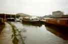 Canal barges and keels moved to temporary moorings near the Canal Basin