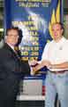 Special Olympics, sponsorship and cheque presentation showing (right) swimmer, Adrian Moorhouse