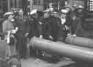 Navy personnel viewing gun barrels at possibly English Steel Corporation Navy personnel viewing gun barrels at possibly English Steel Corporation